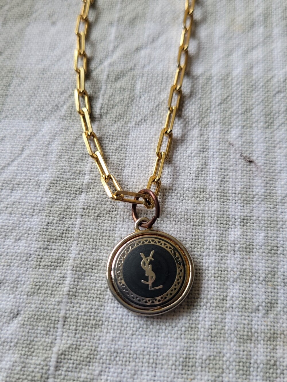Yves Saint Laurent Gold and Black Medallion Pendant Necklace